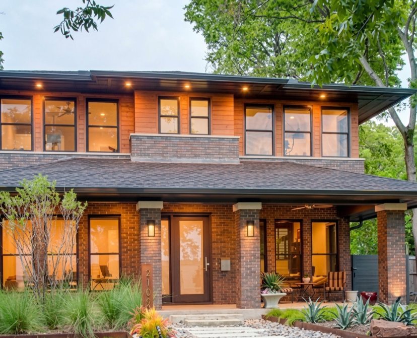Modern home with dark aluminum windows and warm interiors, windows Plano, TX